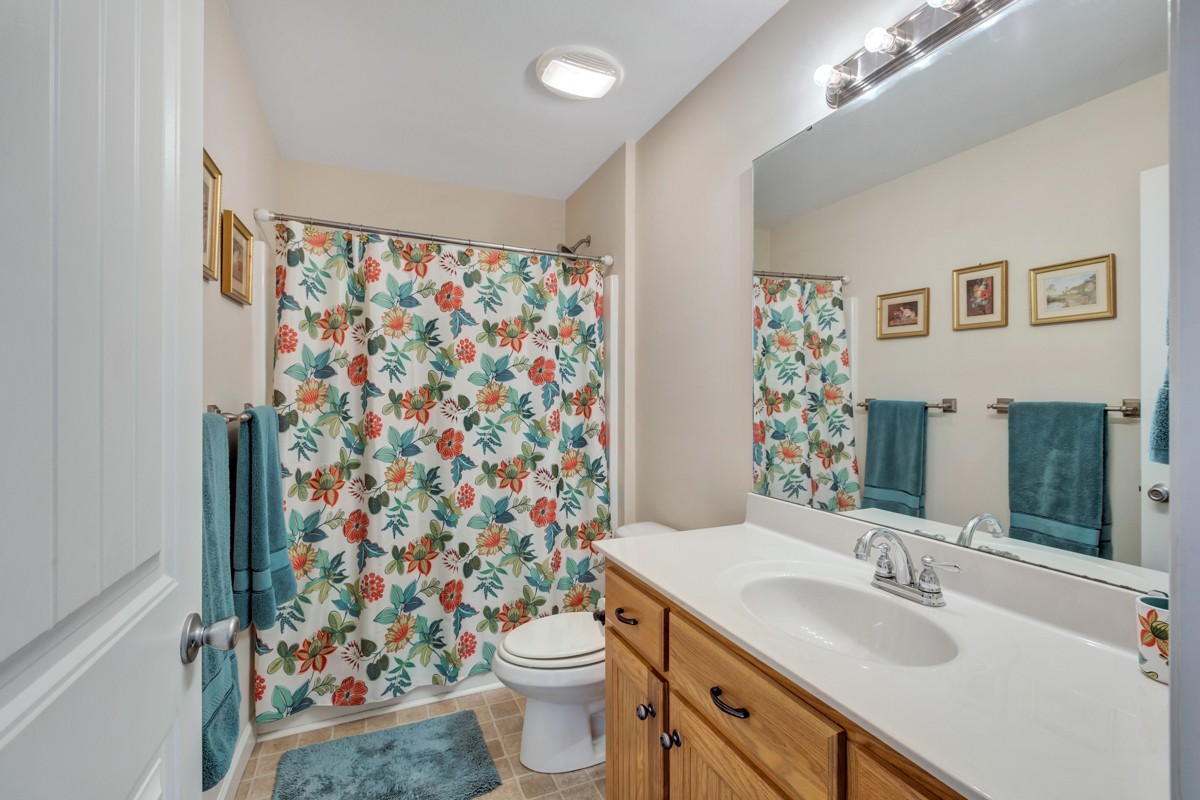 253 Old Baptist Road Ardmore, TN 38449 - Photo 23 of 23 a bathroom with a sink toilet and shower