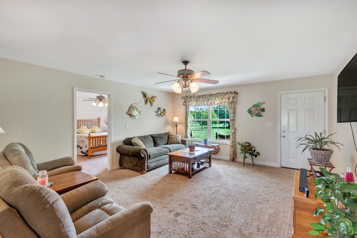 253 Old Baptist Road Ardmore, TN 38449 - Photo 10 of 23 a living room with furniture and a large window