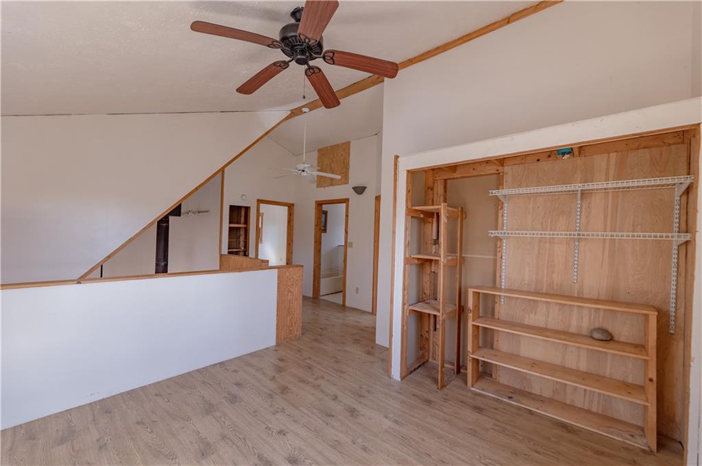 185 Turk Road Slippery Rock, PA 16057 - Photo 17 of 24 a view of entryway with wooden floor and fan