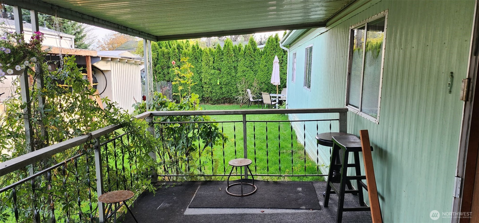 a view of balcony with furniture