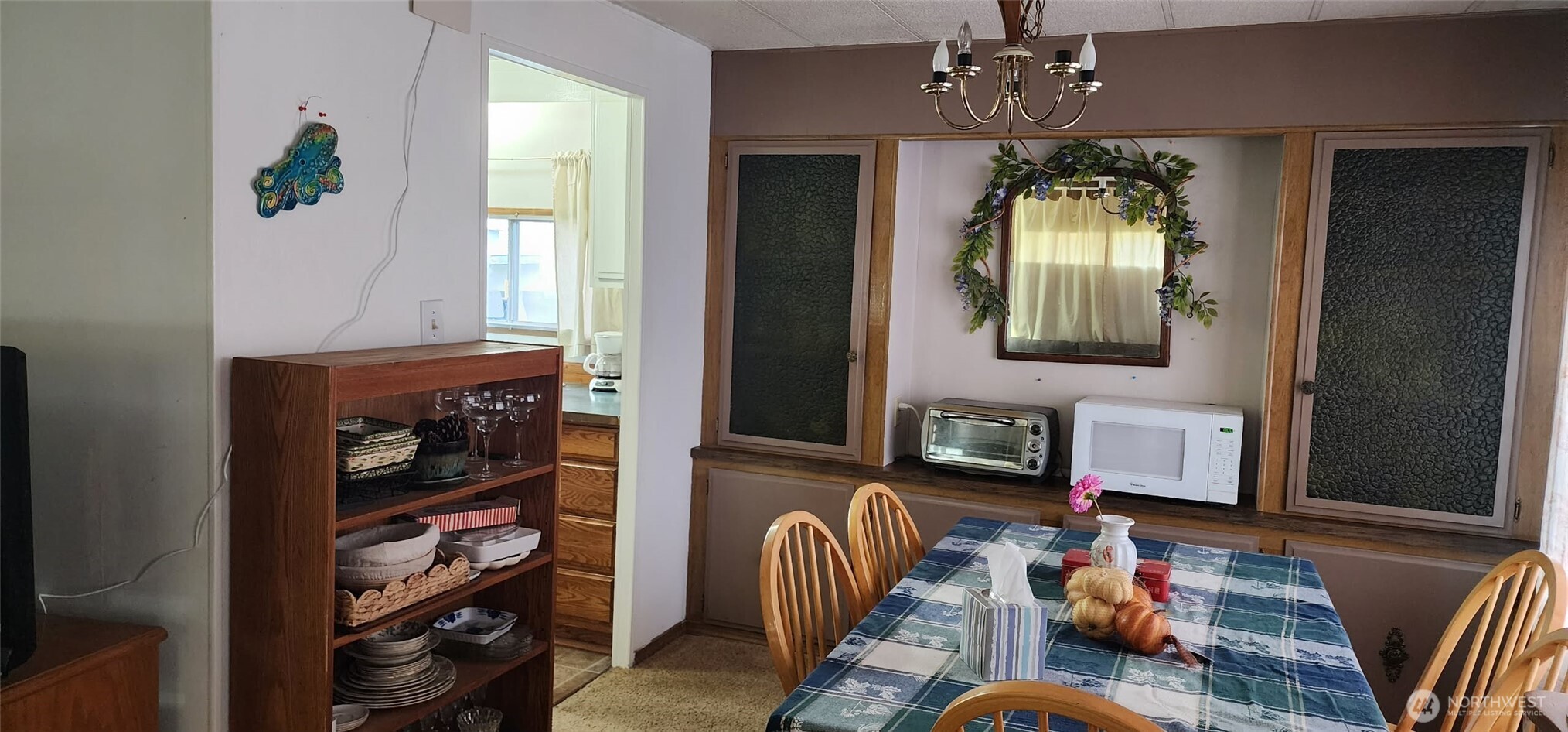 8403 Northeast St Johns Road, Unit 6 Vancouver, WA 98665 - Photo 6 of 9 a living room with furniture and a fireplace