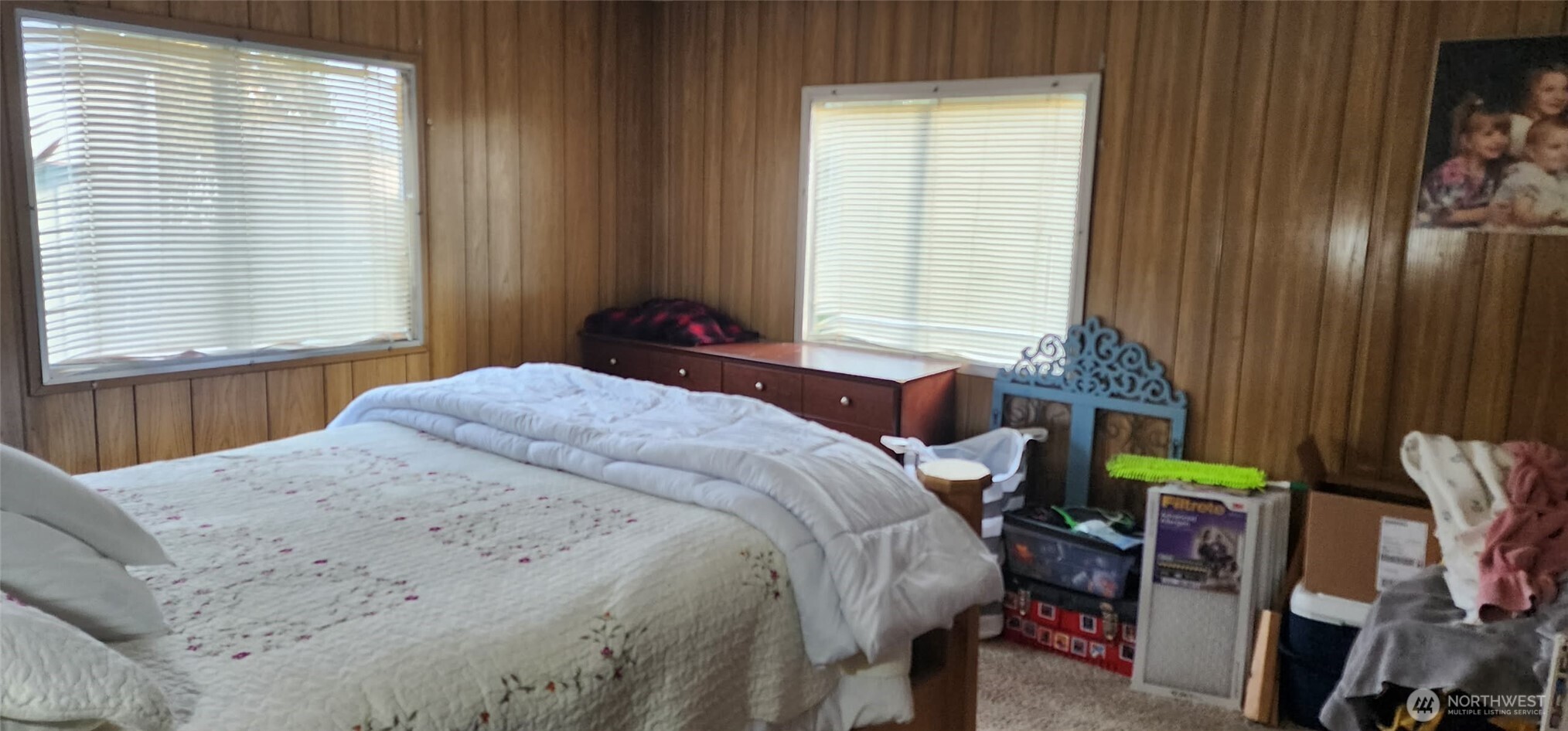 8403 Northeast St Johns Road, Unit 6 Vancouver, WA 98665 - Photo 8 of 9 a bedroom with a bed and a window