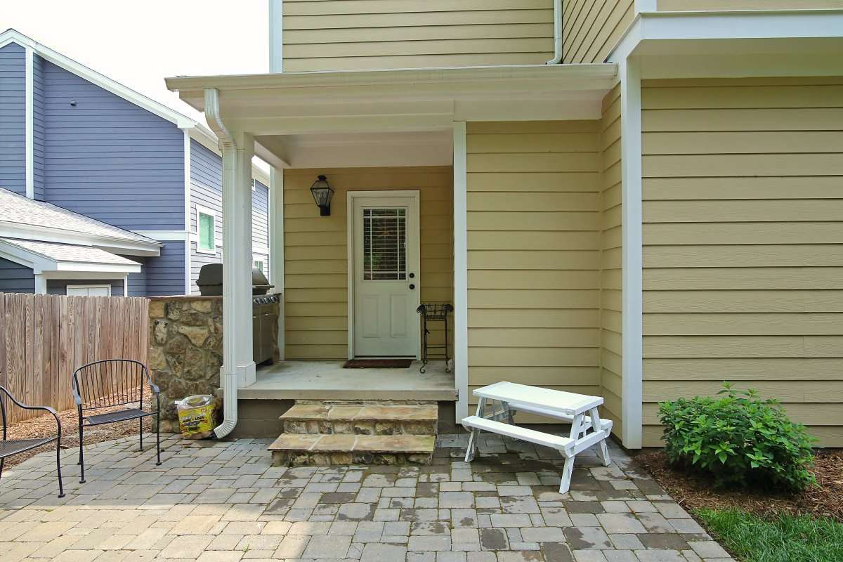 315 Georgetown Road Raleigh, NC 27608 - Photo 23 of 24 Paver patio and grilling area complete this functional entertaining space. Outdoor Space