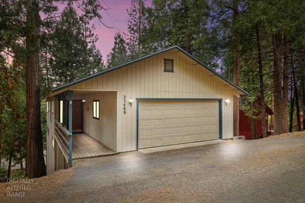 a front view of a house with a garage