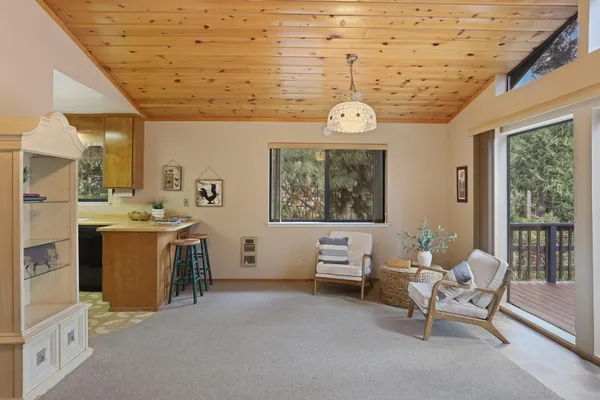 a view of a livingroom with furniture and window