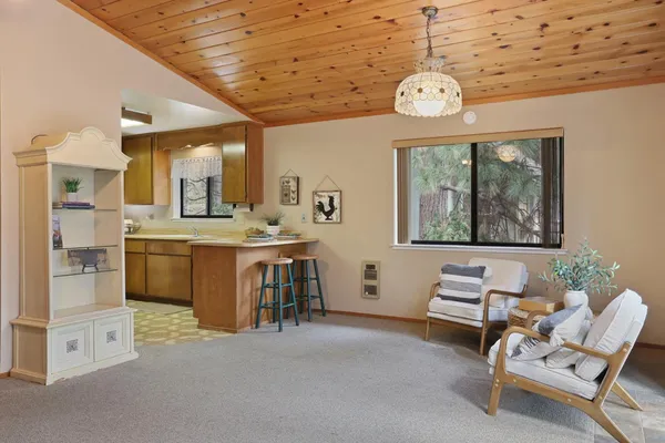 a very nice looking kitchen with a large window