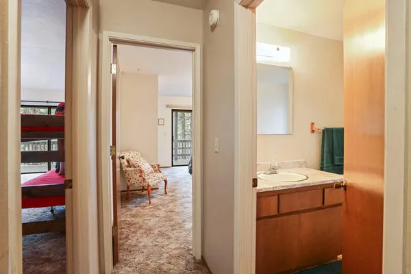 a view of utility room and bedroom