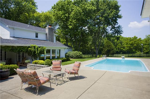 1488 Coleman Road Franklin, TN 37064 - Photo 15 of 20 The back of the property boasts of an in-ground swimming pool and a great patio, perfect for entertaining all your friends