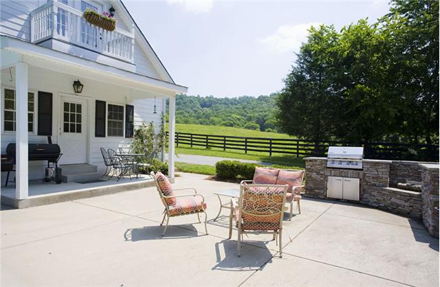 1488 Coleman Road Franklin, TN 37064 - Photo 16 of 20 Another view of the patio with a built-in outdoor kitchen and fire pit