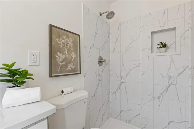 a view of a livingroom with wooden floor