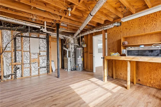 an aerial view of house with yard space