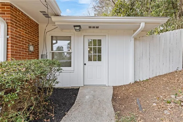 an aerial view of a house with outdoor space