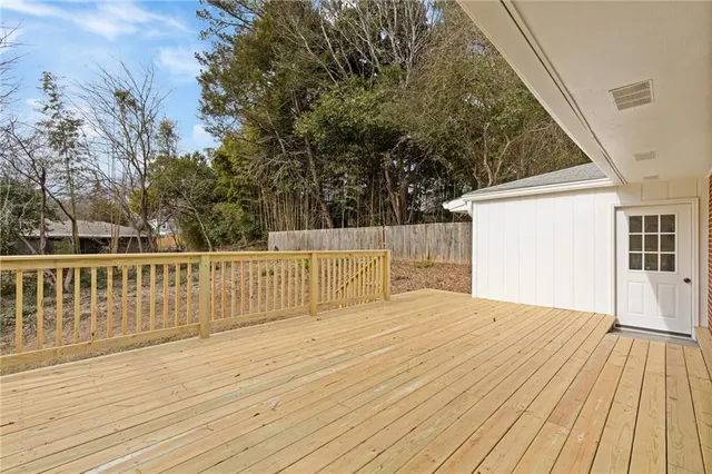 an aerial view of a house with yard swimming pool and outdoor seating