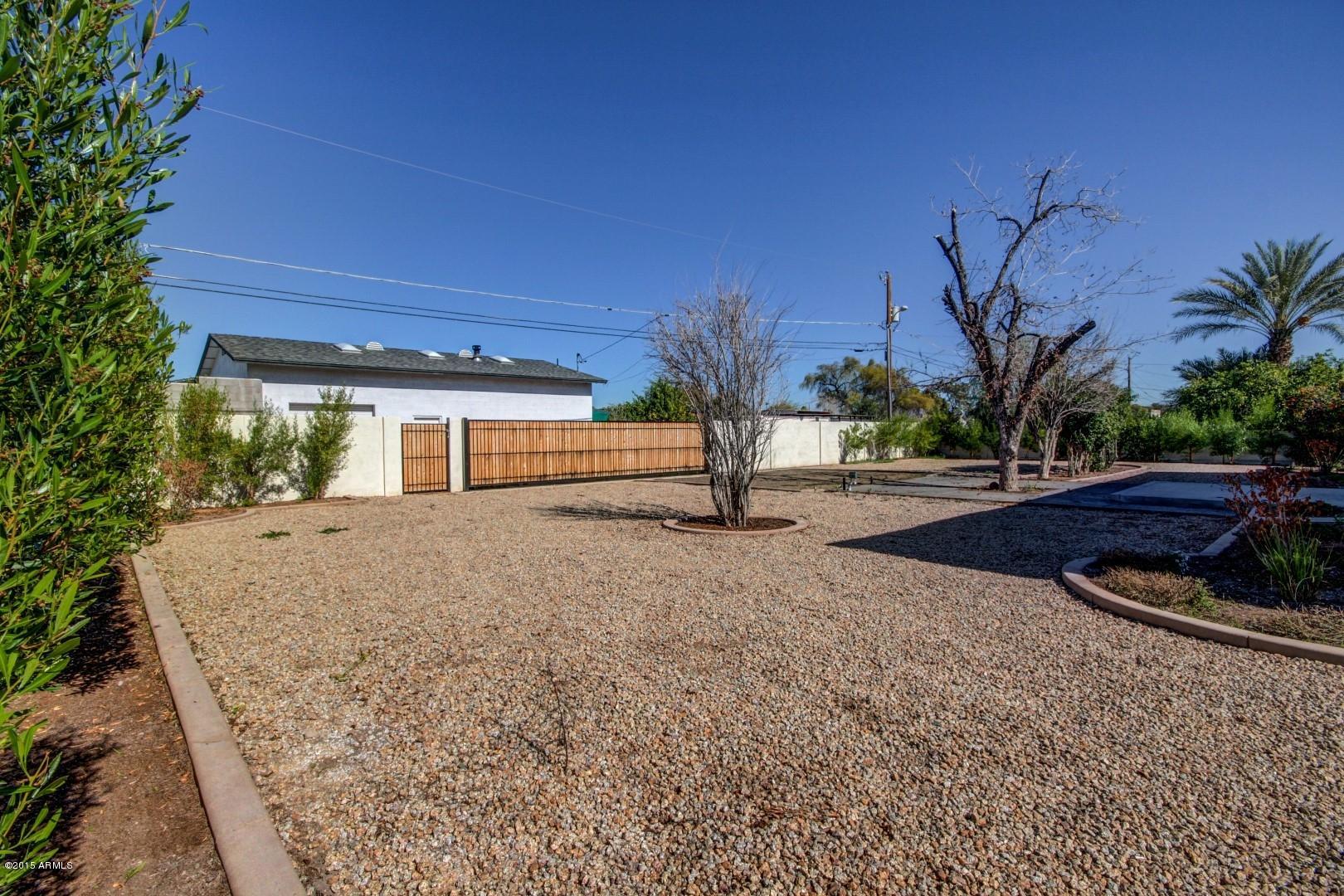 3028 East Charter Oak Road Phoenix, AZ 85032 - Photo 27 of 30 RV Gate in Backyard