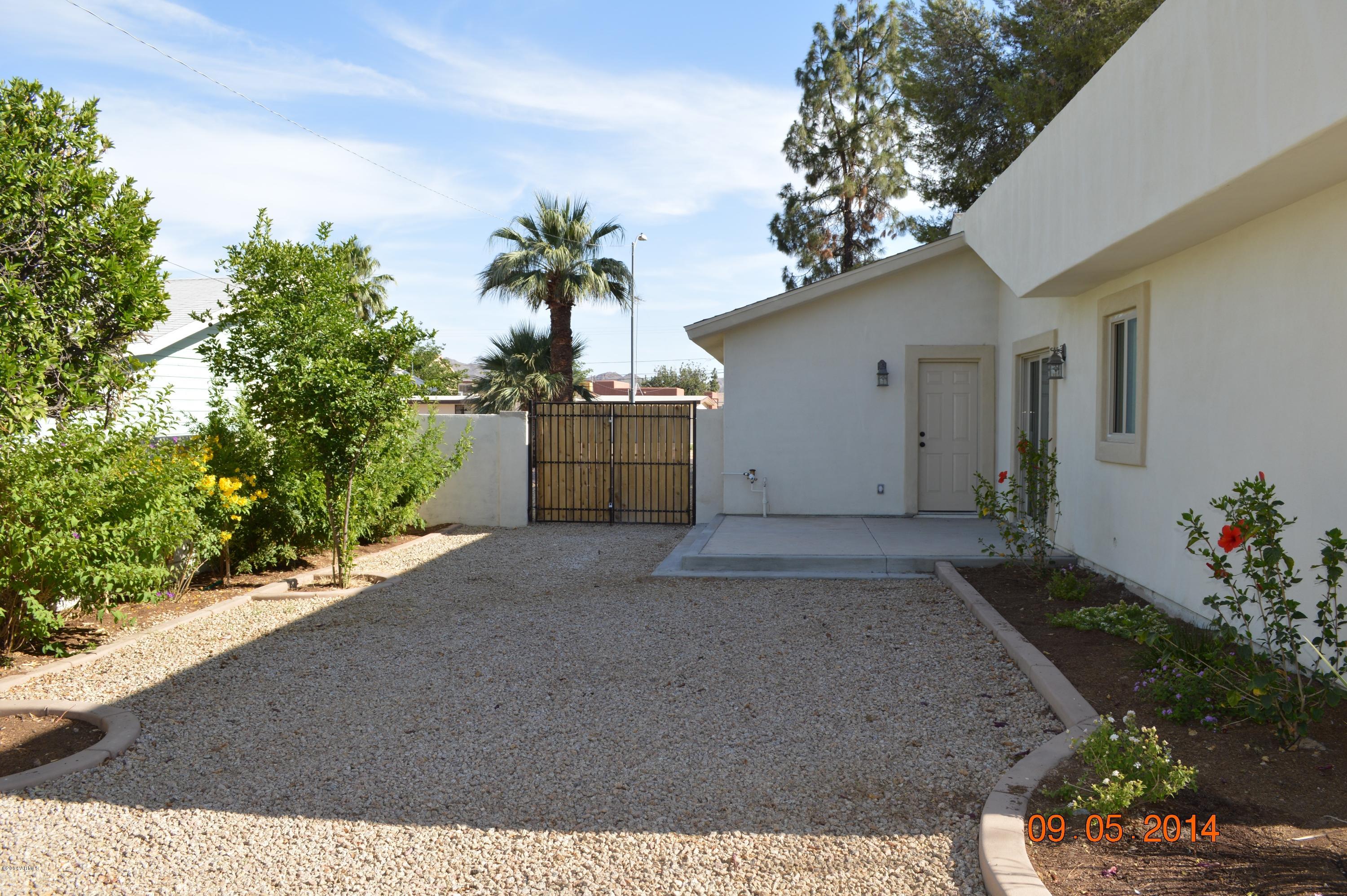 3028 East Charter Oak Road Phoenix, AZ 85032 - Photo 28 of 30 East side yard with RV Gate