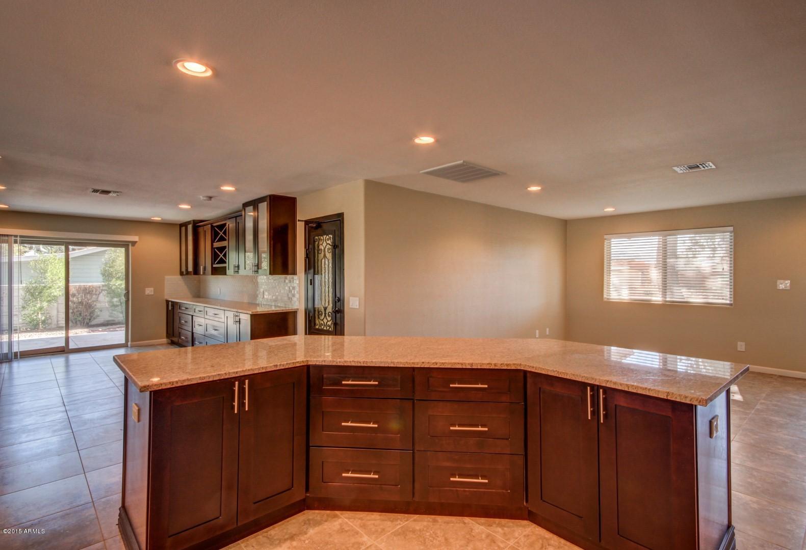 3028 East Charter Oak Road Phoenix, AZ 85032 - Photo 9 of 30 Kitchen Island