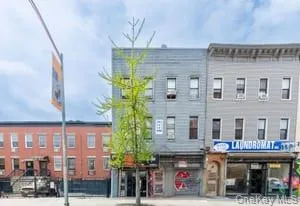 a front view of a building with street