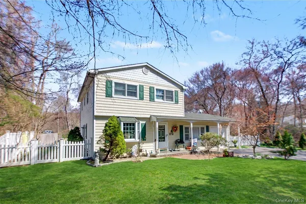 a house view with a backyard space