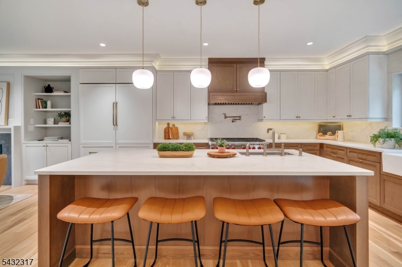 266 Brooklake Road Florham Park, NJ 07932 - Photo 13 of 50 a kitchen with a dining table and chairs