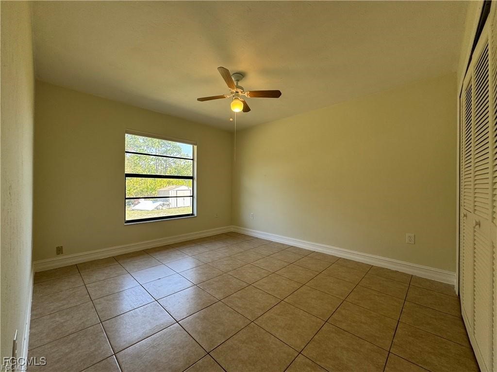 645 Homestead Road South Lehigh Acres, FL 33974 - Photo 16 of 17 a view of an empty room with a window