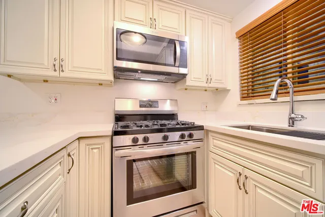 a view of a livingroom with wooden floor