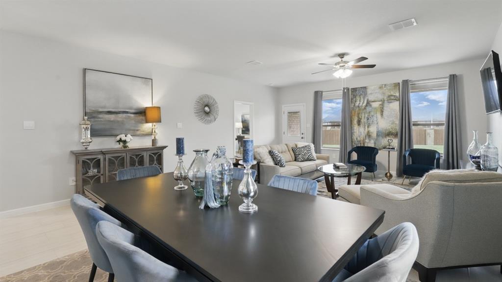 705 Amber Flds Drive Ponder, TX 76259 - Photo 9 of 35 a view of a dining room with furniture window and outside view