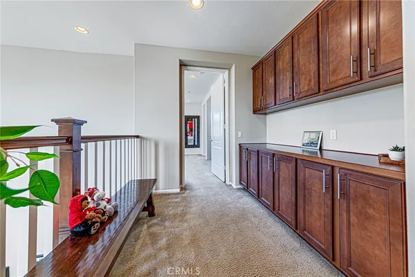a view of a livingroom with furniture and windows