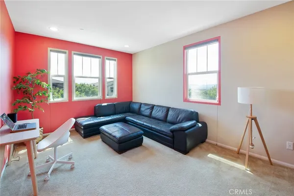 a view of cabinets a washer and dryer