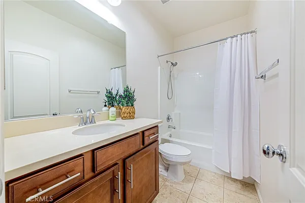 a table and chairs in front of a building
