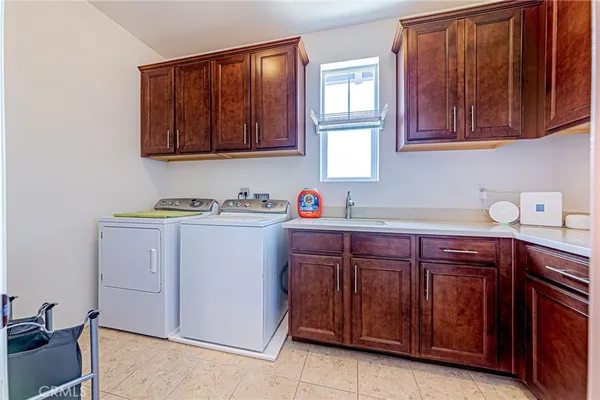 a view of a patio with garden and plants
