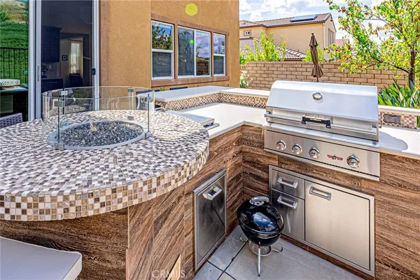a view of swimming pool with outdoor seating