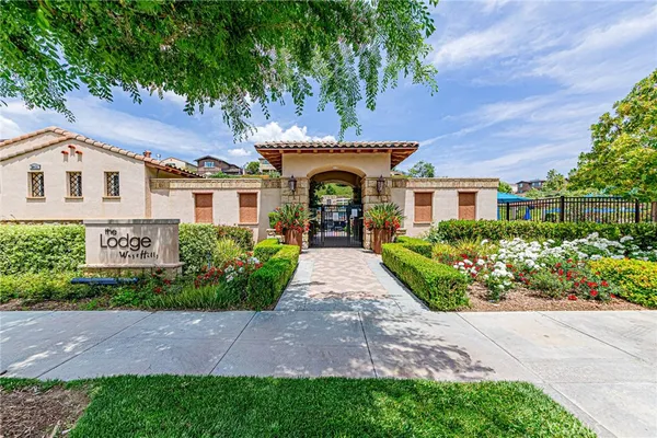 an aerial view of residential building and an ocean
