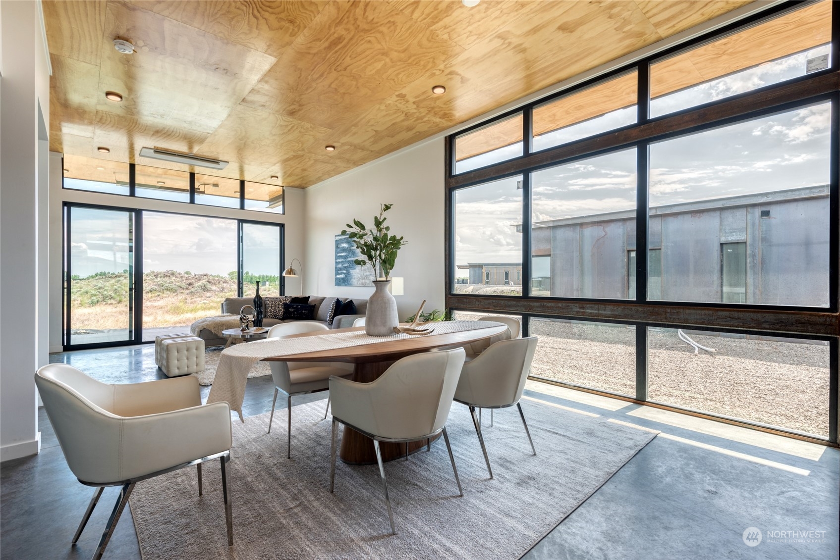 228 (lot 32) Nw Rattlesnake Point Road Quincy, WA 98848 - Photo 12 of 38 a view of a dining room with furniture window and wooden floor
