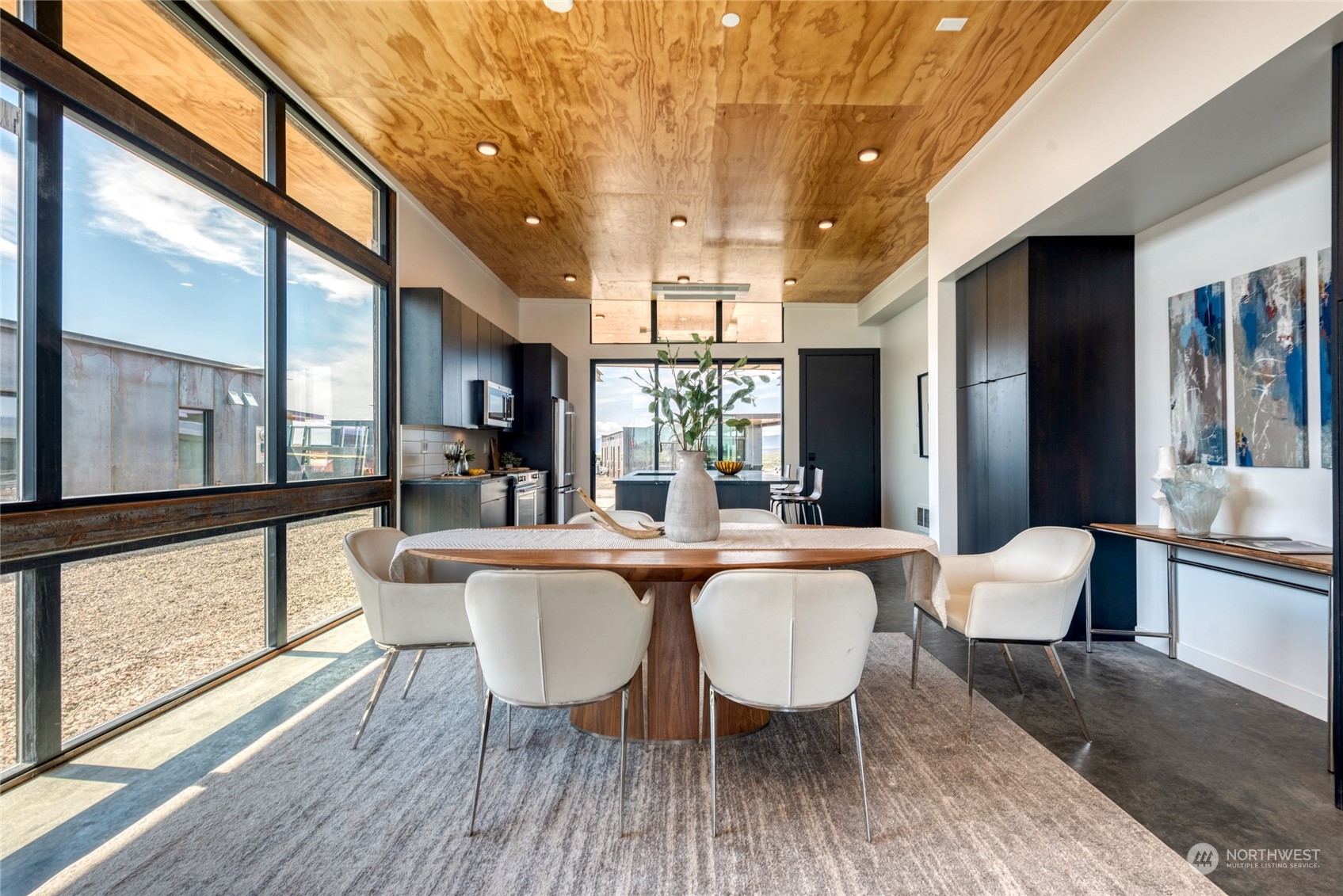 228 (lot 32) Nw Rattlesnake Point Road Quincy, WA 98848 - Photo 10 of 38 a view of a dining room with furniture window and wooden floor