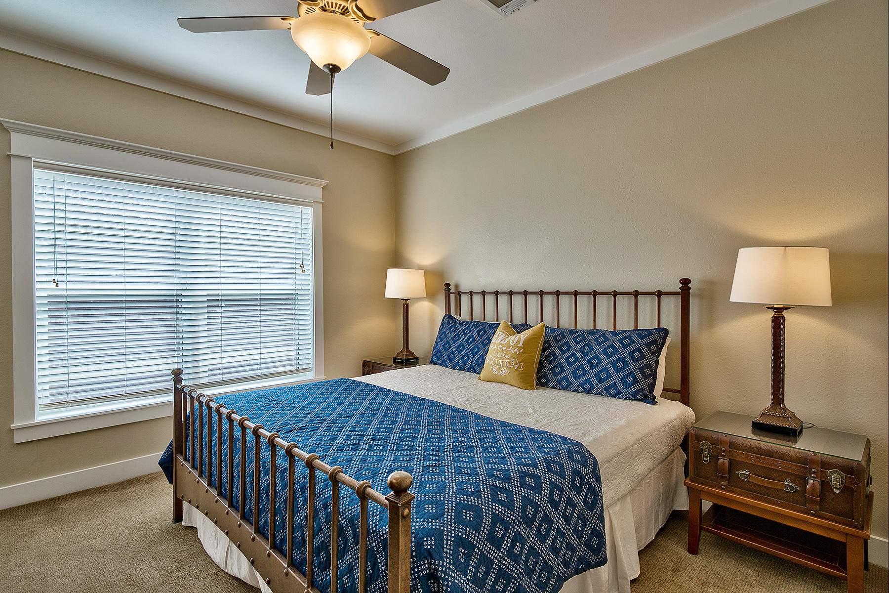 171 Chivas Lane Santa Rosa Beach, FL 32459 - Photo 11 of 32 a bedroom with a bed and a chandelier
