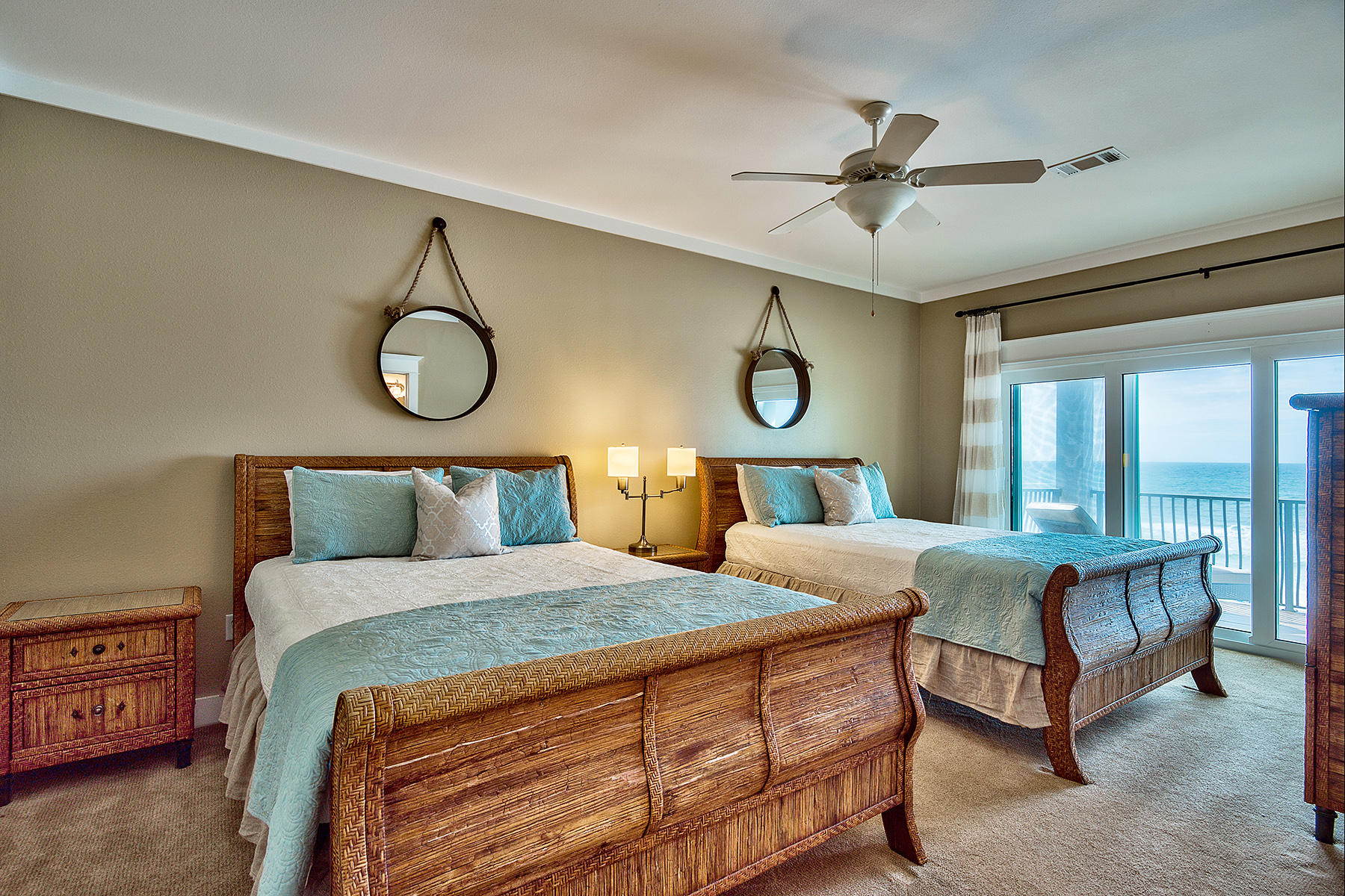 171 Chivas Lane Santa Rosa Beach, FL 32459 - Photo 14 of 32 a bedroom with a bed a ceiling fan and a chandelier