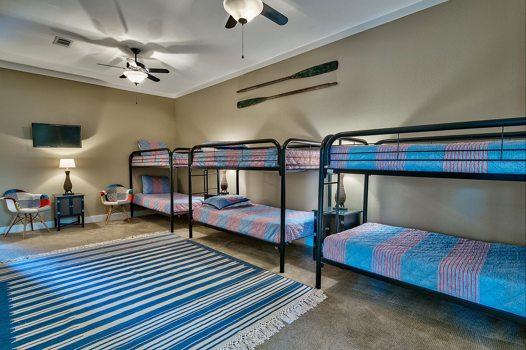 171 Chivas Lane Santa Rosa Beach, FL 32459 - Photo 21 of 32 a bedroom with furniture and a chandelier