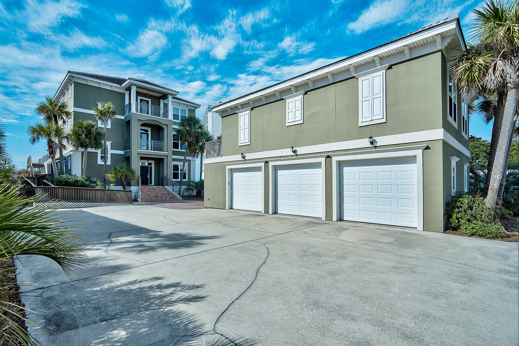 171 Chivas Lane Santa Rosa Beach, FL 32459 - Photo 28 of 32 a front view of a house with a yard and garage