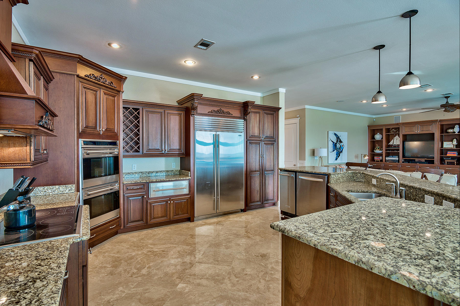 171 Chivas Lane Santa Rosa Beach, FL 32459 - Photo 8 of 32 a kitchen with stainless steel appliances granite countertop a sink a stove and a refrigerator