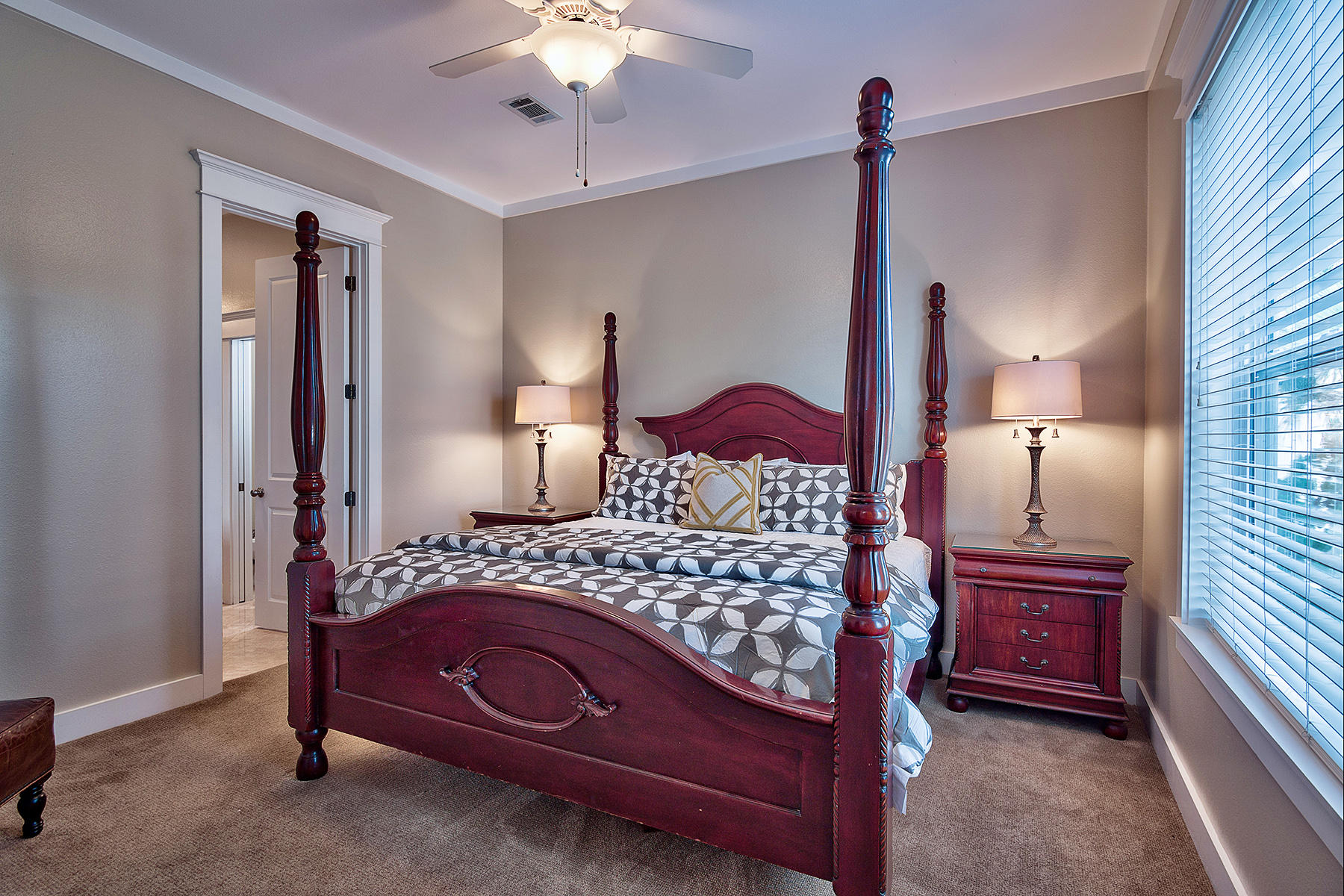 171 Chivas Lane Santa Rosa Beach, FL 32459 - Photo 9 of 32 a bedroom with a bed and a table lamp