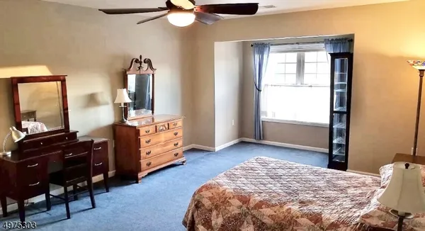 a bathroom with a toilet and a sink