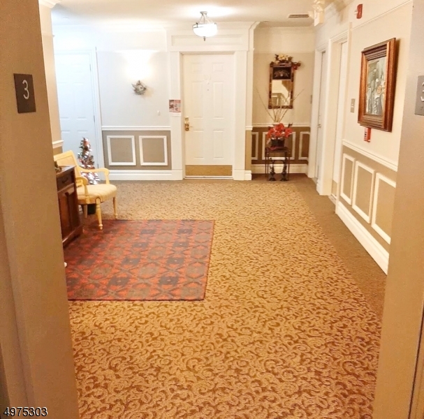 16 Main Street, Unit 1 Sparta, NJ 07871 - Photo 25 of 28 a living room with furniture