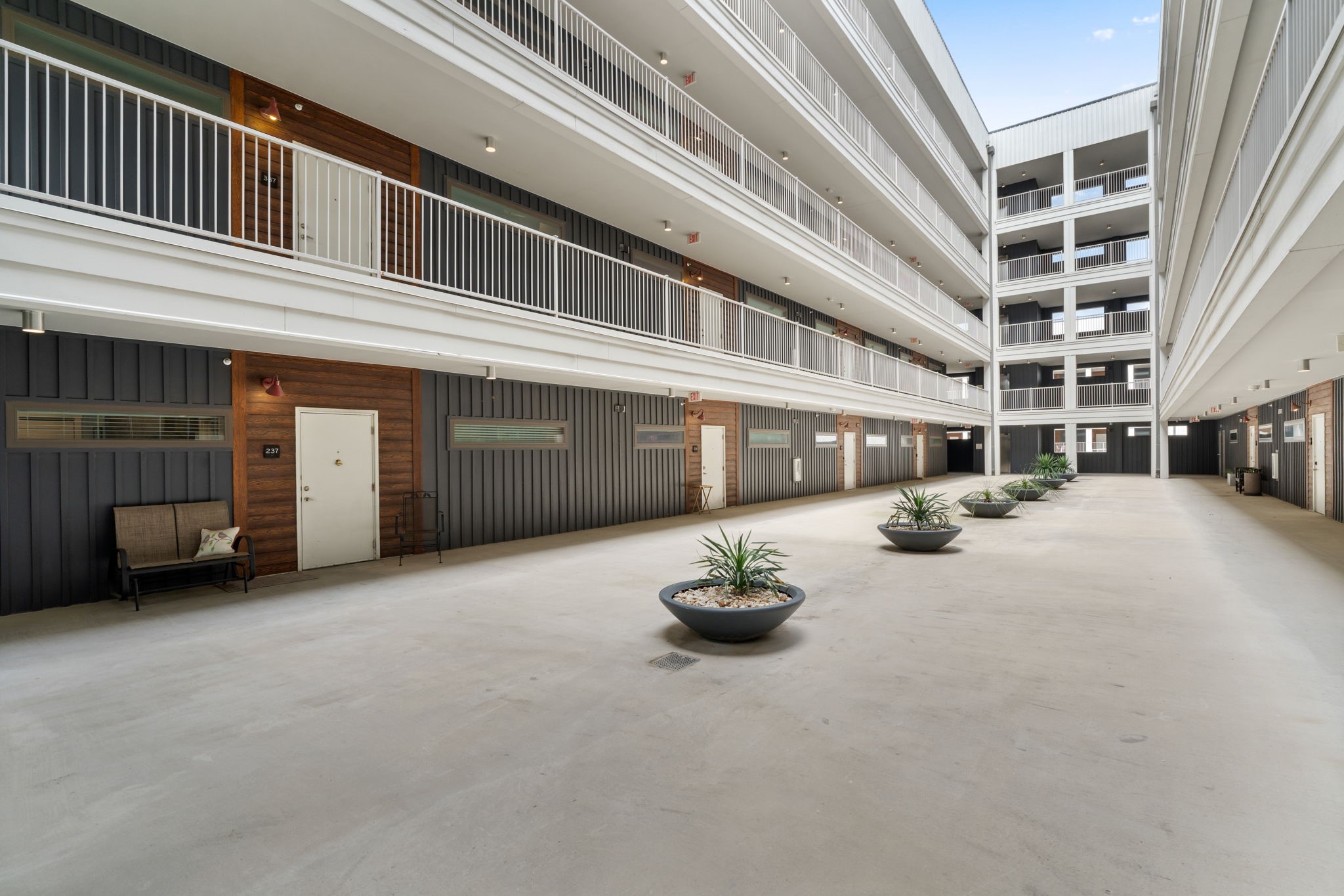 4361 South Congress Avenue, Unit 237 Austin, TX 78745 - Photo 21 of 28 a living room with furniture and a ceiling fan