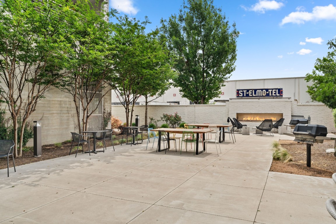 4361 South Congress Avenue, Unit 237 Austin, TX 78745 - Photo 23 of 28 a view of outdoor space with seating area and trees