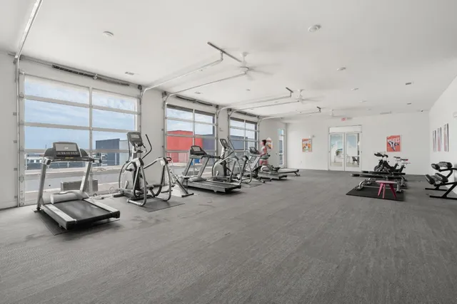 a view of a room with gym equipment