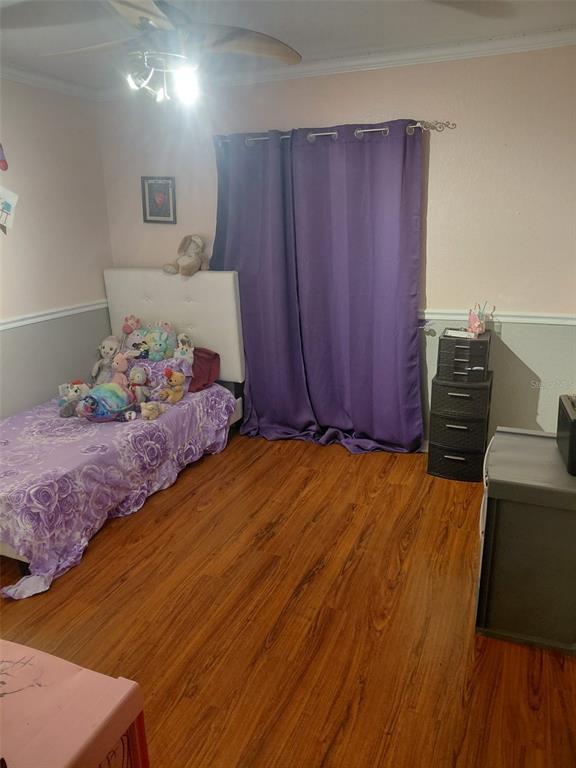 11382 Mahopac Road Weeki Wachee, FL 34614 - Photo 15 of 35 a bed room with a bed