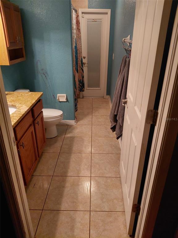 11382 Mahopac Road Weeki Wachee, FL 34614 - Photo 21 of 35 a bathroom with a toilet and a shower