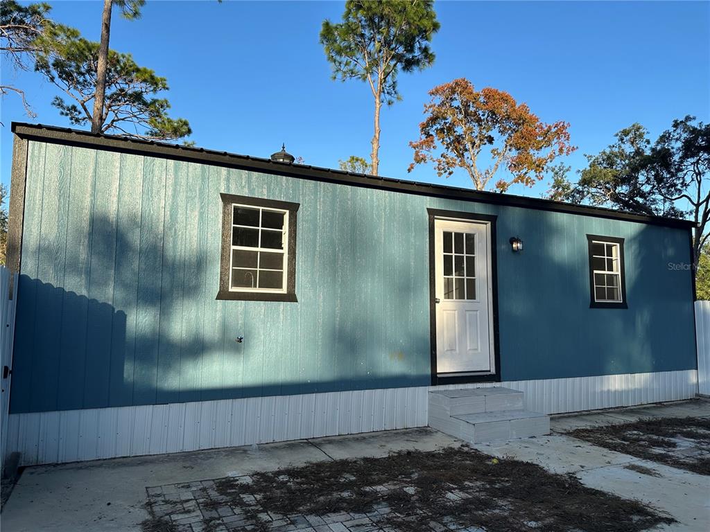 11382 Mahopac Road Weeki Wachee, FL 34614 - Photo 27 of 35 a front view of a house