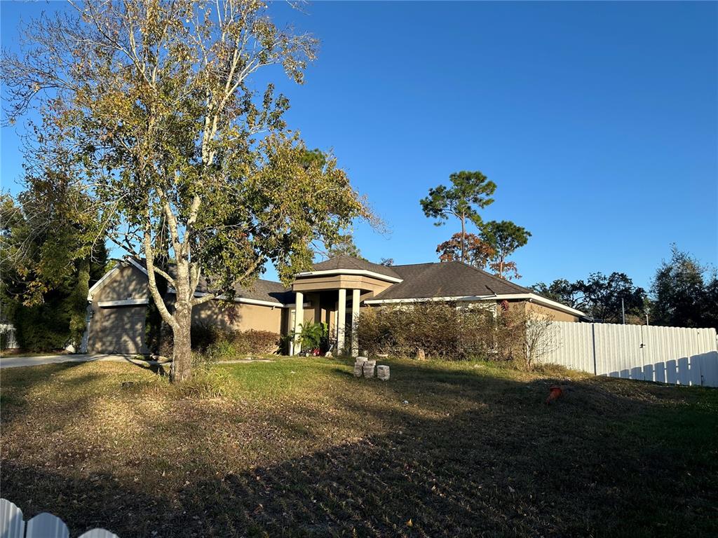 11382 Mahopac Road Weeki Wachee, FL 34614 - Photo 3 of 35 a view of house with yard