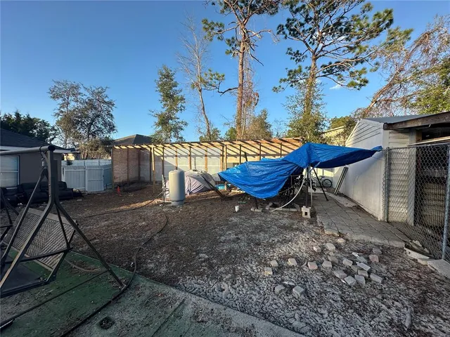 a view of a terrace with chairs